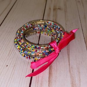 Little girls clear plastic multi colored confetti bracelets